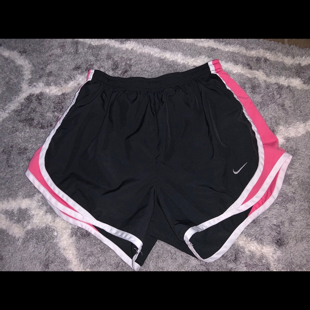 black and pink nike athletic shorts